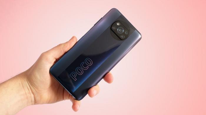 A Xiaomi Poco X3 Pro in someone's hand, from the back